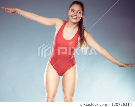 Portrait of smiling lifeguard lifesaver woman. 120726314