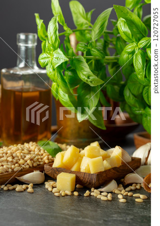 Ingredients for making Pesto sauce on a black stone table. Ingredients for making Pesto sauce on a black stone table. 120727055