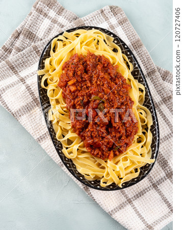 Tagliatelle with vegan tomato bolognese ragu with soya protein granules 120727406