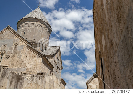 Explore the serene beauty of Haghartsin Monastery under a vibrant sky near Dilijan Armenia Explore the serene beauty of Haghartsin Monastery under a vibrant sky near Dilijan Armenia 120728477