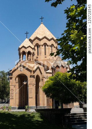 Architectural beauty of a historic Armenian church in the heart of Yerevan during bright daylight 120728545