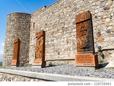 Intricate stone carvings at Khor Virap Monastery with Ararat backdrop under clear blue sky in Armenia Intricate stone carvings at Khor Virap Monastery with Ararat backdrop under clear blue sky in Armenia 120728561