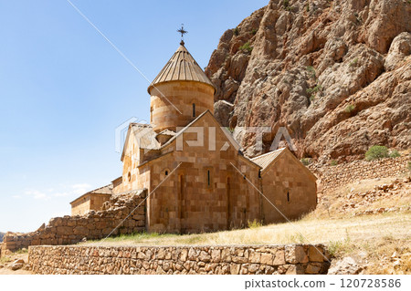Majestic Noravank Monastery nestled in the captivating red mountains of Armenia under a clear blue sky Majestic Noravank Monastery nestled in the captivating red mountains of Armenia under a clear blue sky 120728586