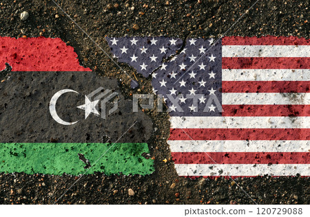 On the pavement are images of the flags of Libya and the United States, as a symbol of confrontation. On the pavement are images of the flags of Libya and the United States, as a symbol of confrontation. 120729088