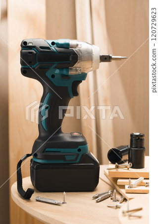 The latest Cordless Electric Drill. 120729623
