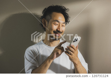 A man operating a smartphone 120731124