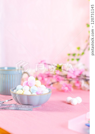 A small plate piled high with Ramune and study materials 120731145