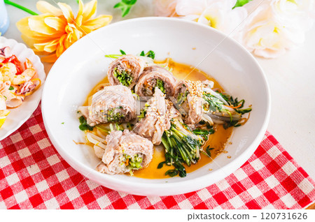 Pork wrapped in pea sprouts with ponzu sauce 120731626