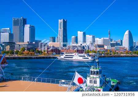 Yokohama cityscape in Japan, overlooking Minato Mirai. In the foreground is the training ship Taisei Maru, docked at Osanbashi Pier. (November 28th) 120731956