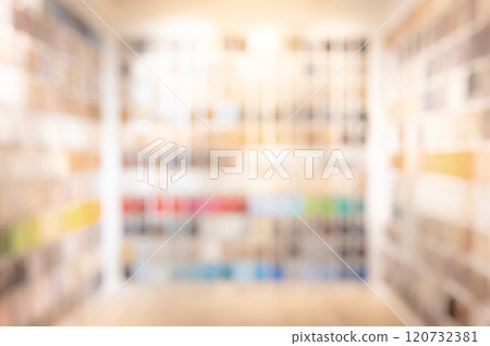 Blurred material library room. Defocused perspective of material samples collection 120732381