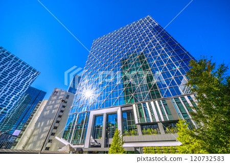 Tokyo cityscape in Japan: Shibuya Cross Tower reflected in window glass overlooking Shibuya Aqsyu and other areas = 25th 120732583