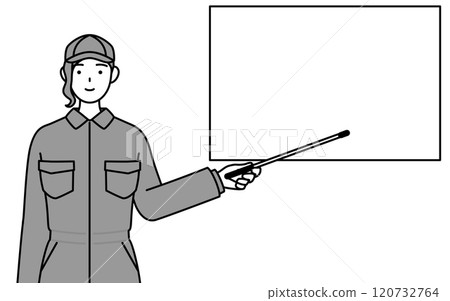 A female mechanic in overalls points to a whiteboard with a pointer A female mechanic in overalls points to a whiteboard with a pointer 120732764