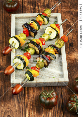 Grilled vegetables on skewers. Grilled vegetables on skewers. 120733691