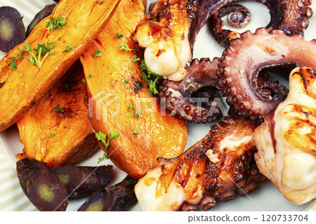 Delicious grilled octopus and sweet potato. 120733704