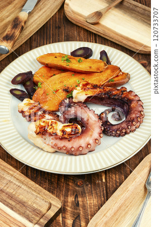 Grilled Octopus Legs. Grilled Octopus Legs. 120733707