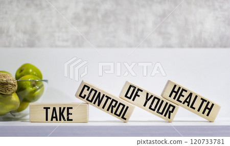 Take control of your health, text with wooden blocks on a white background, the concept Take control of your health, text with wooden blocks on a white background, the concept 120733781