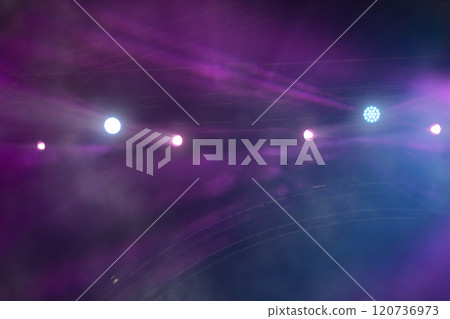 Abstract purple smoky background with stage lighting lamps. 120736973