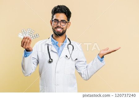 Indian doctor man show lot of tablet pills in blisters recommends drugs vitamin antibiotic treatment Indian doctor man show lot of tablet pills in blisters recommends drugs vitamin antibiotic treatment 120737240
