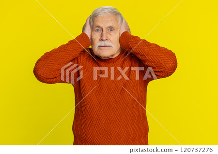Annoyed irritated senior man covering ears gesturing no avoiding advice ignoring noise loud voices 120737276