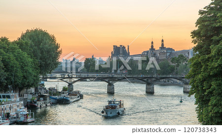 View to Pont des Arts in Paris after sunset day to night timelapse, France View to Pont des Arts in Paris after sunset day to night timelapse, France 120738343