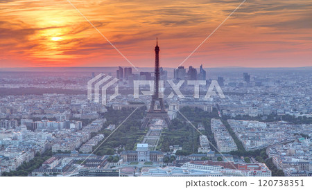 Panorama of Paris at sunset timelapse. Eiffel tower view from montparnasse building in Paris - France Panorama of Paris at sunset timelapse. Eiffel tower view from montparnasse building in Paris - France 120738351