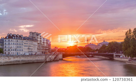 Le Pont D'Arcole bridge at sunset with people and boats timelapse, Paris, France, Europe Le Pont D'Arcole bridge at sunset with people and boats timelapse, Paris, France, Europe 120738361