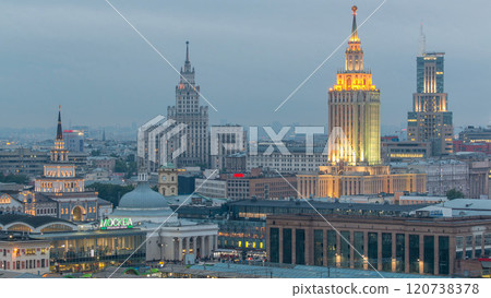 Evening top view of three railway stations day to night timelapse at the Komsomolskaya square in Moscow, Russia Evening top view of three railway stations day to night timelapse at the Komsomolskaya square in Moscow, Russia 120738378