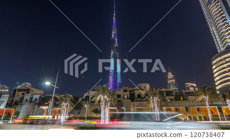 View on modern skyscrapers and busy evening road timelapse hyperlapse in luxury Dubai city, Dubai downtown, United Arab Emirates 120738407