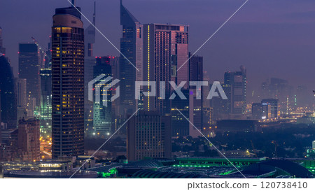 Dubai Downtown night to day timelapse. Aerial view over big futuristic city by night. 120738410