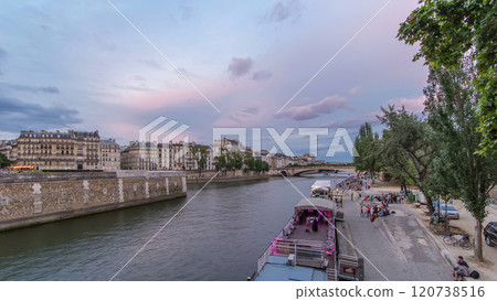 View to the Pont De La Tournelle on the River Seine day to night timelapse with waterfront. 120738516