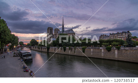 Cathedral Notre Dame de Paris day to night timelapse after sunset in Paris, France. 120738517