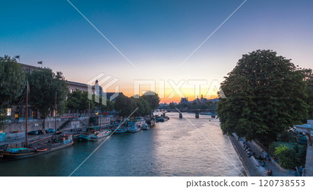View to Pont des Arts in Paris after sunset day to night timelapse, France View to Pont des Arts in Paris after sunset day to night timelapse, France 120738553