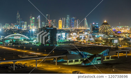Dubai downtown skyline timelapse at night. Rooftop view of Sheikh Zayed road with numerous illuminated towers. Dubai downtown skyline timelapse at night. Rooftop view of Sheikh Zayed road with numerous illuminated towers. 120738696
