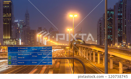 Sheikh Zayed road traffic day to night timelapse and Dubai Metro. Dubai, UAE. 120738745
