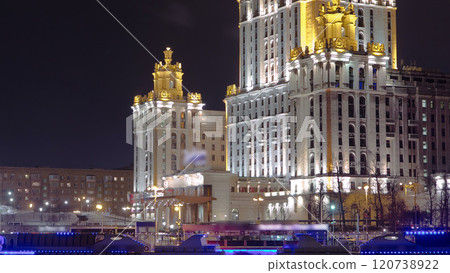 Hotel Ukraine winter night timelapse hyperlapse with bridge over Moscow River. 120738922