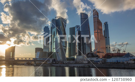 Sunset at Moscow City business center skyscrapers office buildings and luxury apartments timelapse hyperlapse. Sunset at Moscow City business center skyscrapers office buildings and luxury apartments timelapse hyperlapse. 120738960