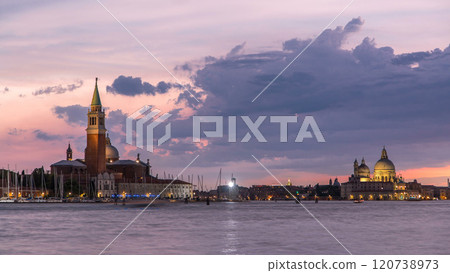 Boats on Grand Canal and Basilica Santa Maria della Salute day to night timelapse, Venice, Italy 120738973
