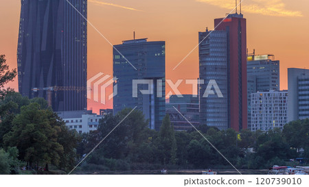 Vienna international center skyscrapers with Kaiserwasser lake reflection view day to night timelapse 120739010