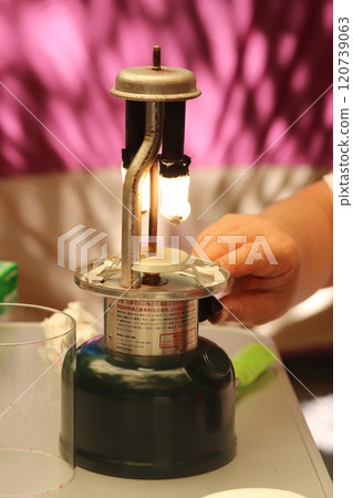 Burning the mantle of a gasoline lantern Burning the mantle of a gasoline lantern 120739063