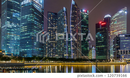 Singapore business district skyscrapers in the night time with water reflections timelapse hyperlapse Singapore business district skyscrapers in the night time with water reflections timelapse hyperlapse 120739166