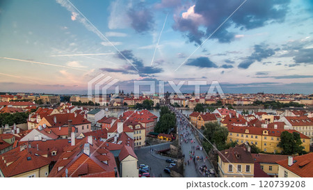 Scenic summer aerial view of the Old Town pier architecture and Charles Bridge over Vltava river timelapse in Praha. Prague, Czech Republic. 120739208