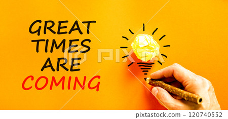Great times are coming symbol. Concept words Great times are coming on beautiful orange paper. Beautiful orange background. Businessman hand. Business great times are coming concept. Copy space. 120740552