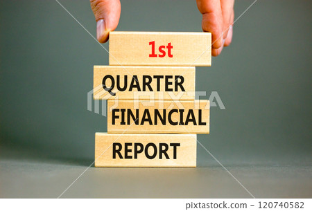 1st quarter financial report symbol. Concept words 1st quarter financial report on beautiful wooden blocks. Beautiful grey background. Business 1st quarter financial report concept. Copy space. 120740582