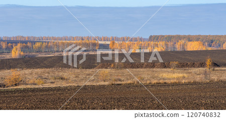 Fields plowed for winter and an autumn rural landscape 120740832