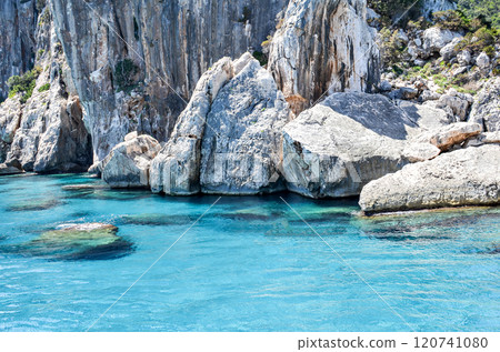 Beautiful view from the sea with crystal clear waters of the National Park of the Gulf of Orosei and Gennargentu, Sardinia Beautiful view from the sea with crystal clear waters of the National Park of the Gulf of Orosei and Gennargentu, Sardinia 120741080