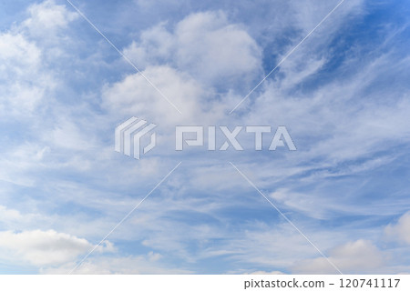 White clouds in a bright blue sky. The beauty of the nature	 120741117