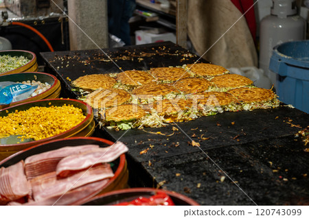 Okonomiyaki sold at a festival stall in Japan 120743099