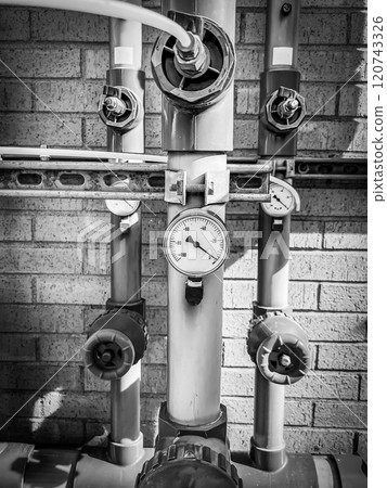 soil vapor extraction test well header with pressure gauge and sample line. 120743326