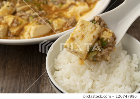 Mapo tofu: Lift up the steaming mapo tofu with a spoon Mapo tofu: Lift up the steaming mapo tofu with a spoon 120747986