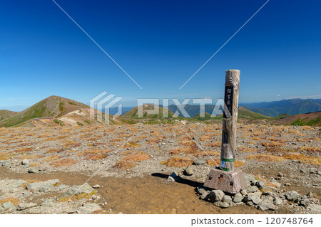Climbing Mount Daisetsu Ohachidaira: Autumn foliage at Japan's 100 famous mountains, a spectacular view in Hokkaido 120748764